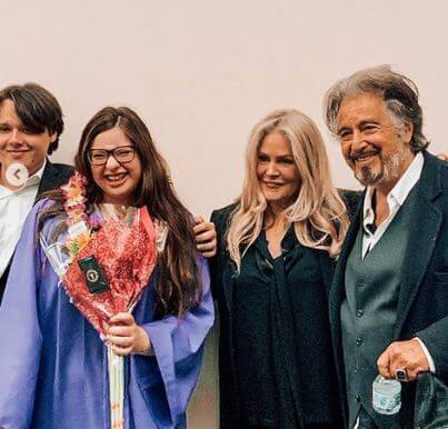 Olivia Pacino with her parents in her high school graduation day